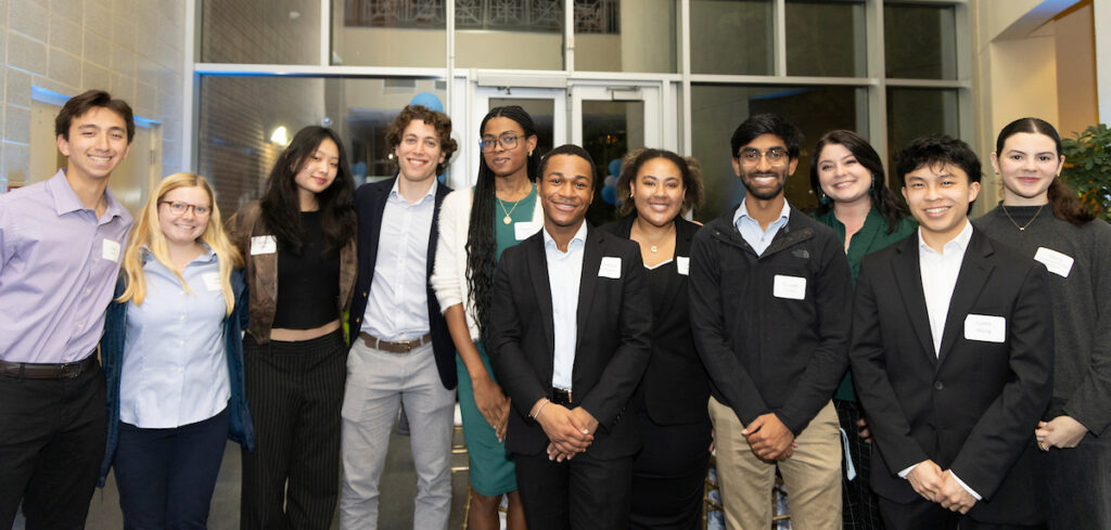 Eve Marie Carson scholars group photo at lecture reception